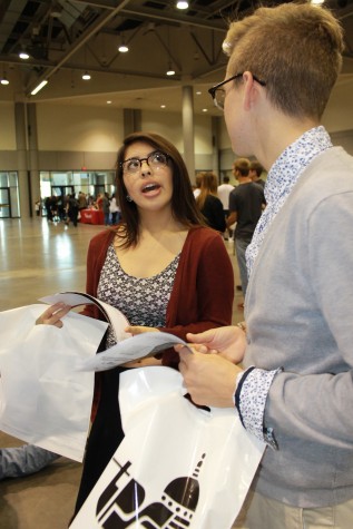 Jessica Barriga and Matthew Gatschet, seniors, take in their day as things come to a wrap at the College & Career Fair and the Kansas Expocenter.