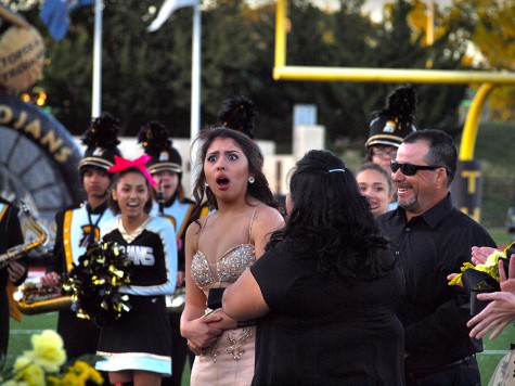 Jessica Barriga, senior, reacts as she is crowned Topeka High's 2015 Homecoming Queen.