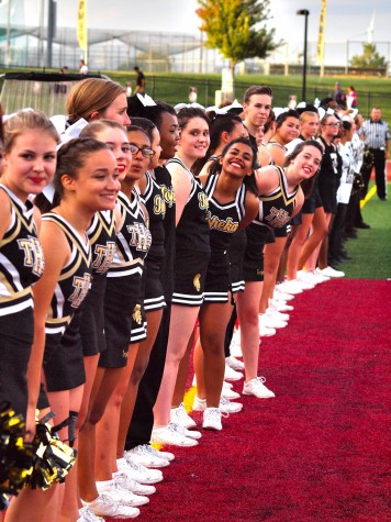 Cheerleaders at a football game earlier this year.