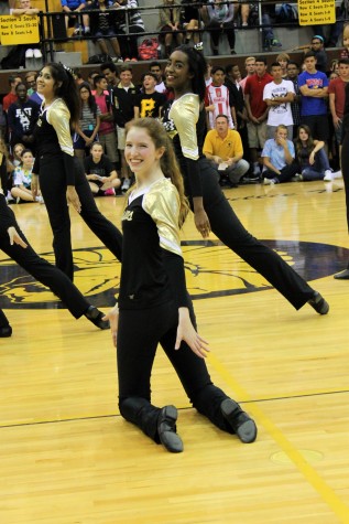 Dance team in the middle of their routine 