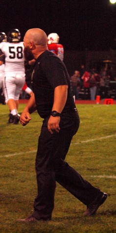 Special teams coordinator Daniel Voth gets the adrenaline flowing on the Trojan sideline after a defensive stop.