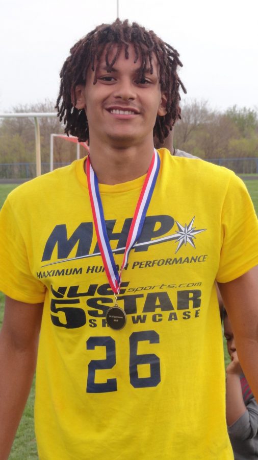 Justice Mitchell, junior, poses for a picture after being ranked as the best defensive back and seventh best overall player at the NUC Sports Five Star regional combine in Richton, Illinois this past Sunday. Mitchell plays defensive back for Topeka High.