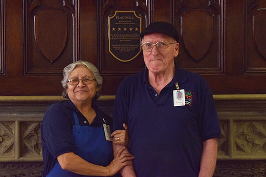 Isabel Chase and Larry Beuchat stand together for one of the last times in the cafeteria before they part. 