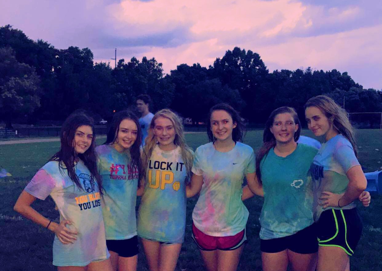 Sophomore girls pose for a picture after Color Chaos. Its a great way to start off the school year and do something fun with all of my friends, said Zoe Dunekack.