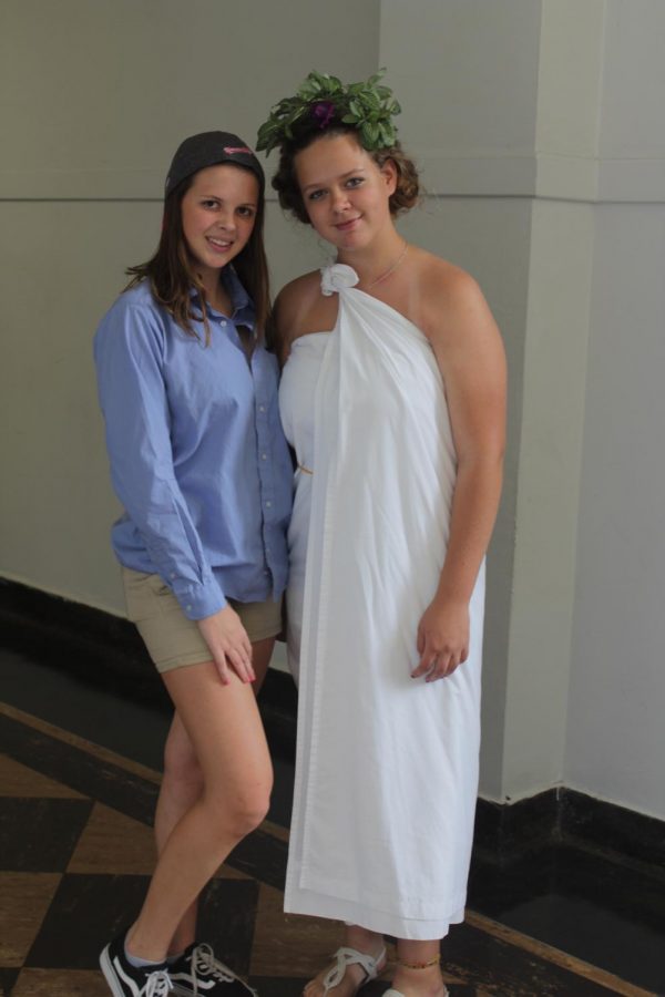 Freshmen Abigail Price and Elizabeth Varelman show off their frat-out and toga wear. 