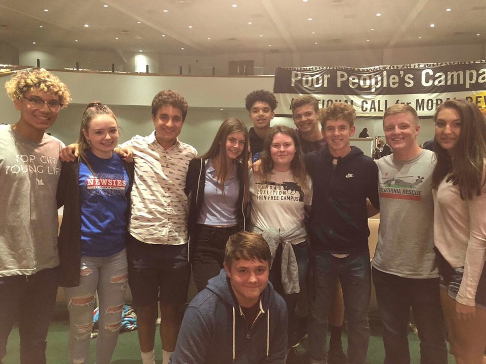 CCPC members at a Poor People's Campaign in Wichita. Co-founders Jack Murphy (middle right) and Ally Watson (center) organized the club's attendance to the rally.
