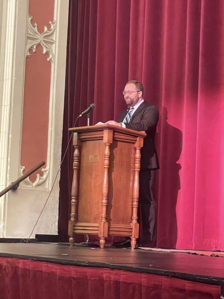 Phillip Wrigley giving a speech while meeting with Governor Laura Kelly in October 2023. Photo Provided.