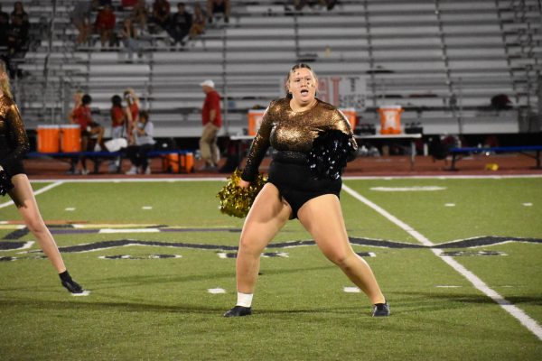 Ryleigh Debacker dancing during the Homecoming game.