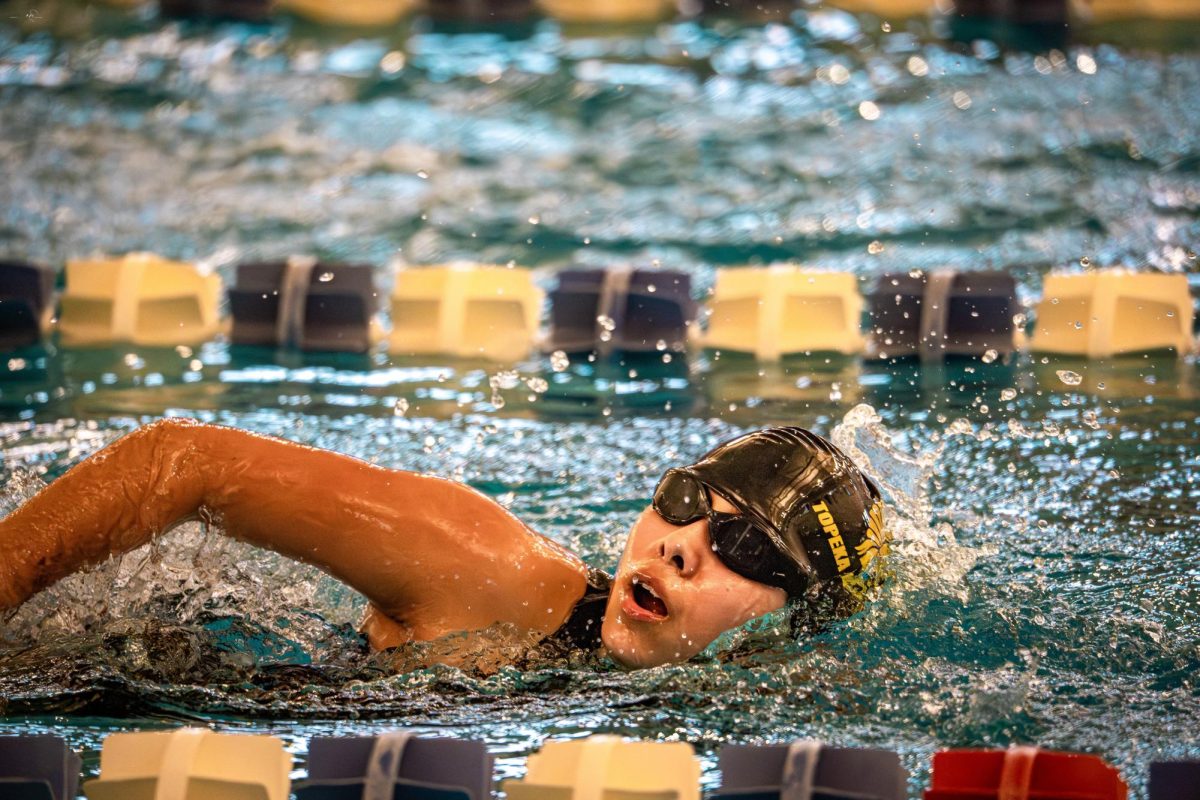 Racing in the 50 meter freestyle, sophmore Yelena Beasley finishes with a time of 0:36:48.